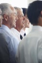 Group Of Delegates Listening To Presentation At Conference