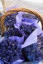 Group of delicate dried lavender bouquets with lila textile material, displayed for sale Royalty Free Stock Photo