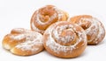 Group of delicious cinnamon rolls icing sugar isolated