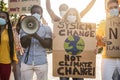 Group of demonstrators on road from different culture and race protest for climate change during coronavirus outbreak - Focus on