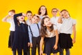 Group of demotivated schoolchildren are standing together Royalty Free Stock Photo