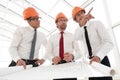 Group of designers of builders working with a new projec Royalty Free Stock Photo