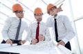 Group of designers of builders working with a new projec Royalty Free Stock Photo