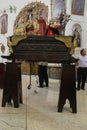 Holy Week in Guatemala: Members of the brotherhoods of the churches prepare the carriers for processions