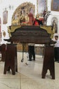 Holy Week in Guatemala: Members of the brotherhoods of the churches prepare the carriers for processions