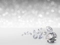 Group of diamonds placed on white background on the right with bokeh Royalty Free Stock Photo