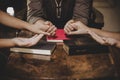 Group of different women praying together Royalty Free Stock Photo