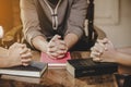 Group of different women praying together Royalty Free Stock Photo