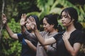 Group of different women praying together Royalty Free Stock Photo