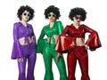 A group of disco girls in African American wigs and colorful costumes Royalty Free Stock Photo