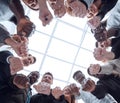 Group of diverse ambitious young people standing in a circle Royalty Free Stock Photo