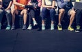 Group of diverse athletes sitting together Royalty Free Stock Photo