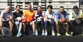 Group of diverse athletes sitting together Royalty Free Stock Photo