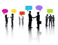 Group of Diverse Business People Sharing Ideas with Colorful Speech Bubble Royalty Free Stock Photo