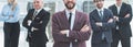 Group of diverse business people standing in the office. Royalty Free Stock Photo