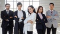 Group of diverse businesspeople  Asian and Caucasian teamwork standing and cross their arms and looking to camera. Idea for multi- Royalty Free Stock Photo