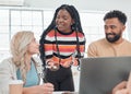 Group of diverse businesspeople having a meeting in a modern office at work. Young african american businesswoman Royalty Free Stock Photo