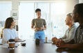 Group of diverse businesspeople having a meeting in an office at work. Young african american businesswoman talking Royalty Free Stock Photo