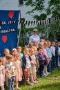 Group of diverse children standing in the park, smiling and enjoying the outdoors Royalty Free Stock Photo