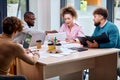 group of diverse colleagues in formal clothing discussing business ideas Royalty Free Stock Photo