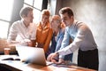 Group of Diverse Designers Having a Meeting Concept. Team of graphic designers having a meeting in office Royalty Free Stock Photo