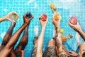 Group of diverse friends enjoying summer time with beverage Royalty Free Stock Photo