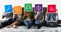 Group of diverse friends holding technology icons Royalty Free Stock Photo