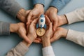 Group of diverse hands collaboratively holding wooden rocket, symbolizing teamwork, innovation, startup unity and collective Royalty Free Stock Photo