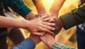 A group of diverse hands join together in a circle, symbolizing unity and teamwork. Royalty Free Stock Photo