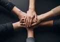 Diverse hands joined together in a symbol of unity and teamwork Royalty Free Stock Photo