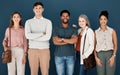 Group of diverse happy businesspeople standing in a row in an office together. Five expert business professionals Royalty Free Stock Photo