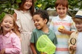 Group of diverse kindergarten kids friends in garden, greenhouse Royalty Free Stock Photo