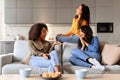 Group of diverse ladies having casual afternoon tea party indoor Royalty Free Stock Photo