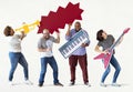 Group of diverse people enjoying music instruments Royalty Free Stock Photo