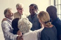 Group of diverse people giving each other support