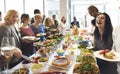 Group of diverse people are having lunch together Royalty Free Stock Photo