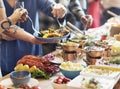 Group of diverse people are having lunch together Royalty Free Stock Photo