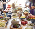 Group of diverse people are having lunch together Royalty Free Stock Photo