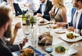 Group of diverse people are having lunch together Royalty Free Stock Photo