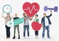 Group of diverse people holding health and fitness icons Royalty Free Stock Photo