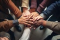 Group of diverse people joining hands together. Teamwork concept. Top view, Group of diverse hands holding each other support Royalty Free Stock Photo