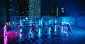 Group of Diverse People Playing Soccer at a Stylish Rooftop Spot with Neon Lights and Skyscrapers at Royalty Free Stock Photo