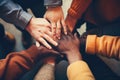 Group of diverse people putting their hands together on top of each other, Close-up of diverse people joining their hands, top Royalty Free Stock Photo