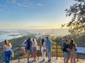 Group of diverse people taking in the breathtaking skyline of Malaga port, Spain