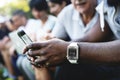 Group of diverse people using digital devices