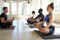 Group of diverse poople practicing yoga