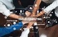 Collaborative Hands Overlaid with Cloud Computing Concepts and Icons Representing Data Management and Security in a Royalty Free Stock Photo