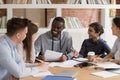 Group of diverse students enjoying study time together. Royalty Free Stock Photo