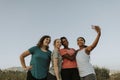 Group of diverse women taking a selfie