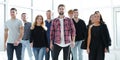 group of diverse young people walking in a new office Royalty Free Stock Photo